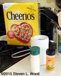 Garlic containers, grinder, and Cheerios for clean-up