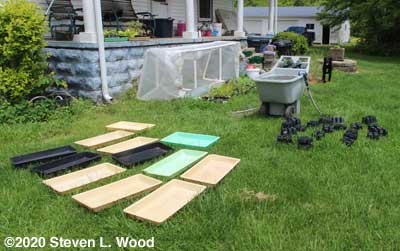 Washing and drying plant trays, pots, and inserts
