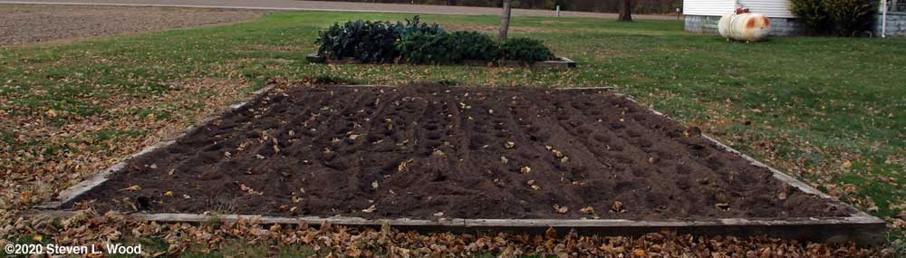 Main raised garden bed tilled