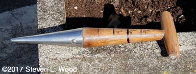 Garlic dibble with depth measurements added