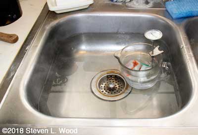 Hot water treating seed