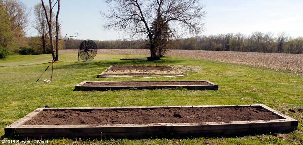 Raised beds tilled and raked