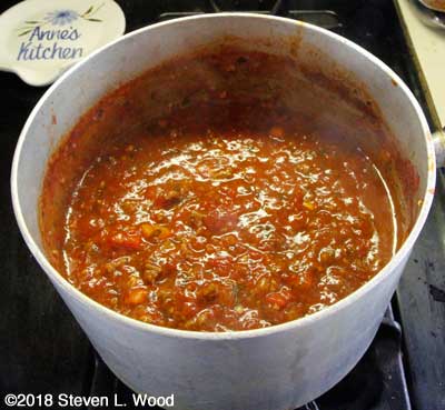 Ingredients combined, thickened, ready to serve over spaghetti noodles