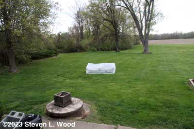 Cold frame blown into yard