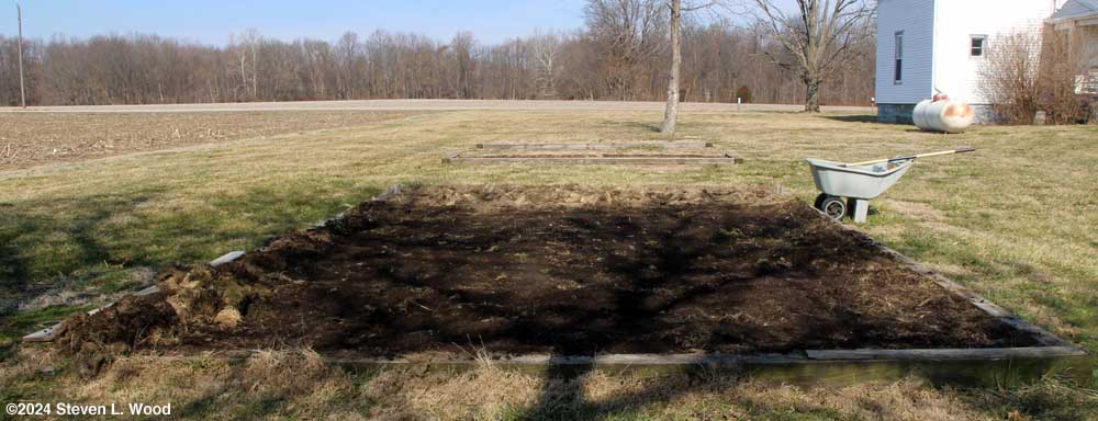 Main riased bed cleared of mulch
